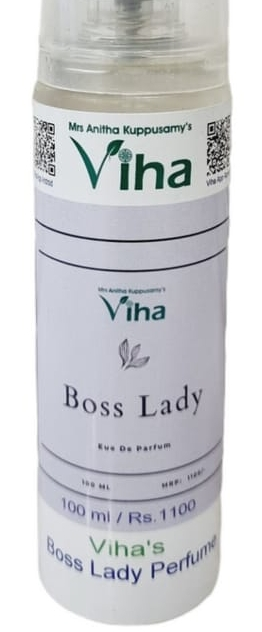 Frosted white perfume bottle labelled Boss Lady