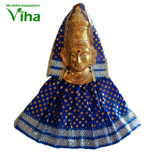 Kalasam with Mahalakshmi face in a blue dress with orange dots