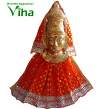 Kalasam with Mahalakshmi face in a red dress with yellow dots