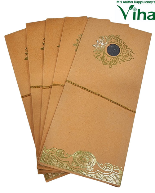 Gift Cover with gold-toned foil floral pattern and string tied horizontally