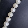 Natural Pearl Mala, seven white textured beads strung diagonally