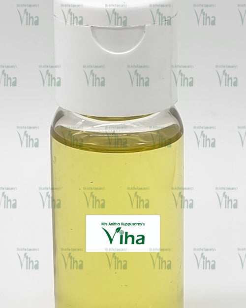 Vitamin E Oil For External Use, a round clear bottle with a white flip-top cap filled with yellowish liquid