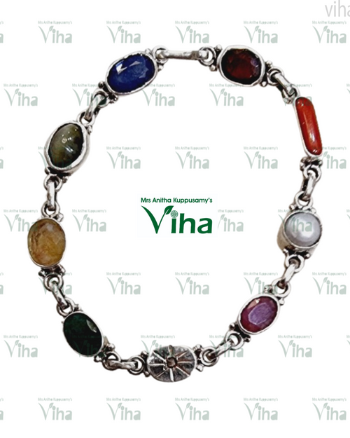 Navratna Bracelet Silver, silver-linked bracelet set with nine different colored oval gemstones