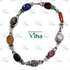 Navratna Bracelet Silver, silver-linked bracelet set with nine different colored oval gemstones