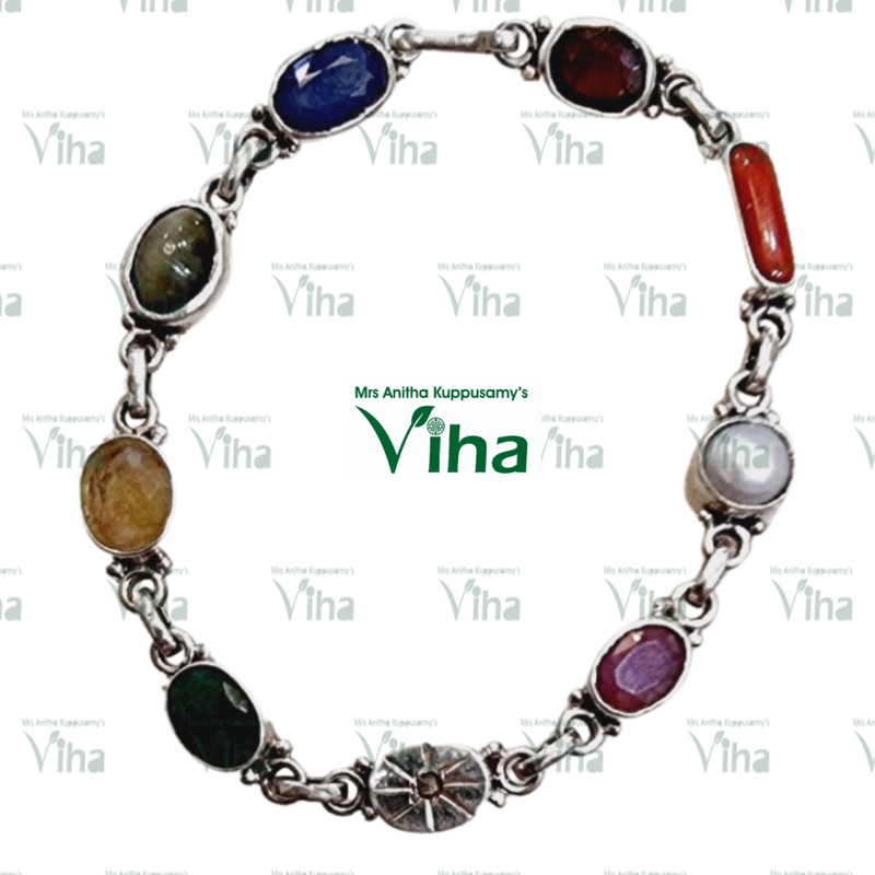 Navratna Bracelet Silver, silver-linked bracelet set with nine different colored oval gemstones