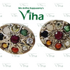 Navratna Studs Silver, oval earrings with a central red stone