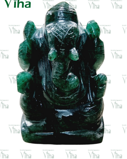 Jade Ganesh, dark green carved elephant-headed figure with curved trunk