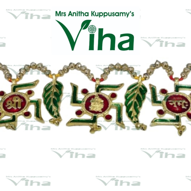 Swastik Thoran, a gold-toned decorative hanging featuring alternating green-enamelled leaves, swastikas, and roundels interspersed with beaded swags