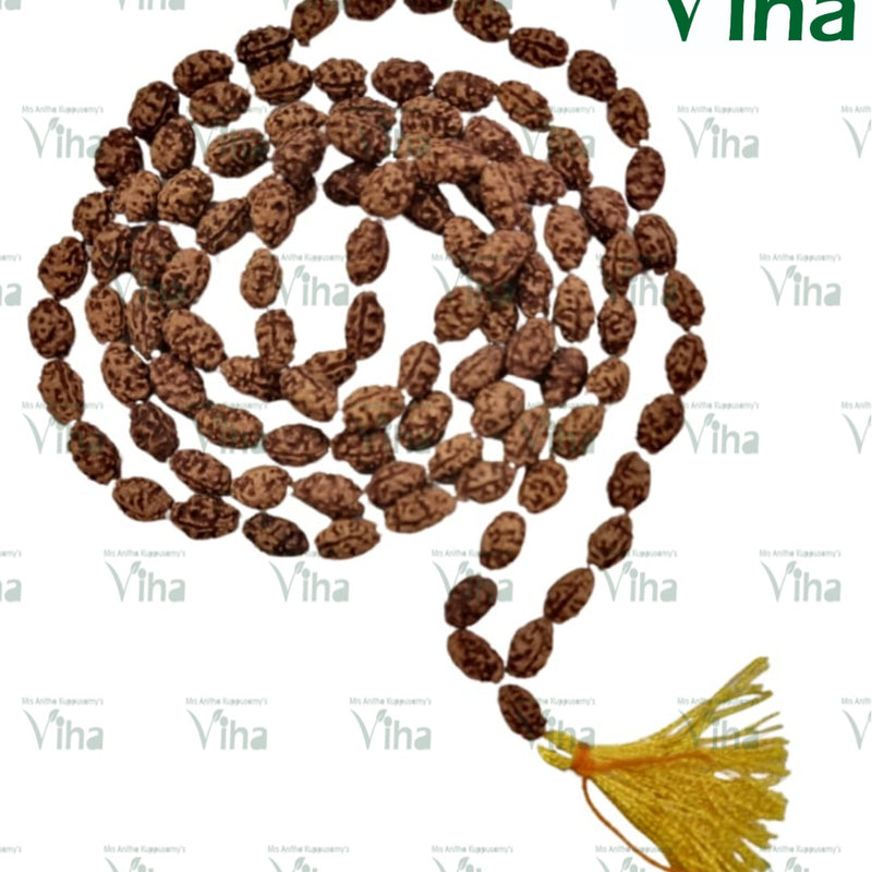 Face Rudraksh Mala, a long strand of brown textured oval beads with a yellow tassel at one end
