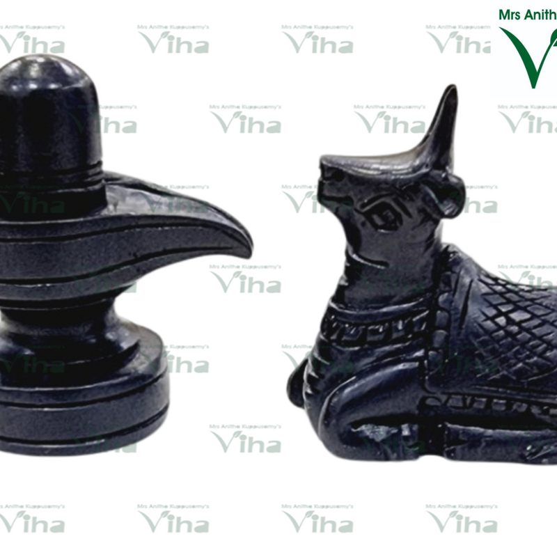 Karungali Wood Shivling Nandi Set, two dark grey polished stone figurines including a rounded pillar and a seated animal with textured blanket