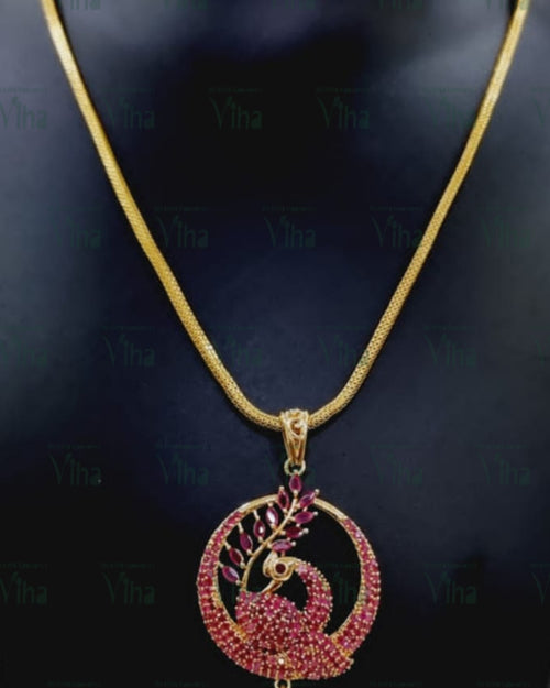 Impon Pendant Chain with a circular pendant and red stone bird motif