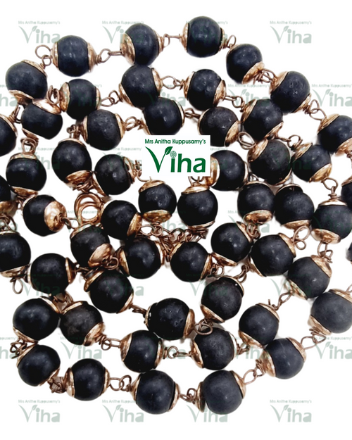 Karungali Copper Cappings Mala, a gold-toned chain necklace with dark matte beads set in gold-toned metal caps