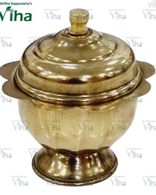 Kumkum Chimizh, tall brass lidded container with domed lid with a conical finial, scalloped rim on the main body