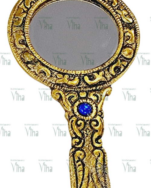 Hand Mirror, gold-toned metal mirror with an engraved handle set with a blue stone