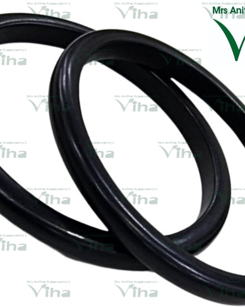 Karungali Wood Bangle, two black smooth glossy round bangles positioned diagonally overlapping each other