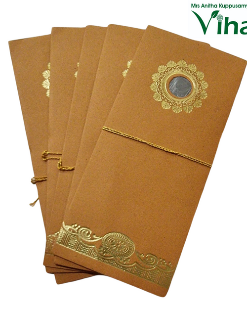 Gift Cover, five brown pouches fanned out and tied with gold-toned string
