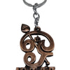 Vel Keychain with ornate sculpted symbol