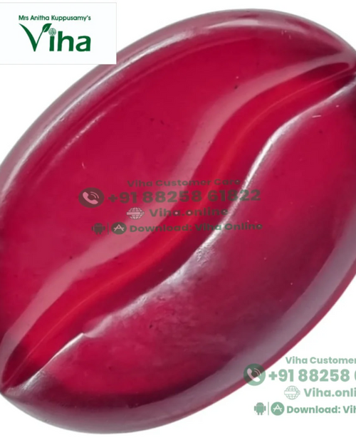 Red Wine Handmade Soap, one glossy reddish-pink coffee bean shaped cabochon with a curved central groove
