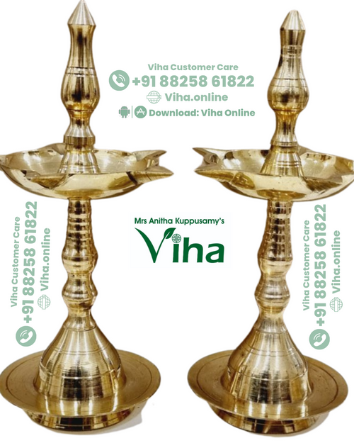 Five-face brass kuthu vilakku pair, five-point oil wells on slender turned stems with wide flared bases