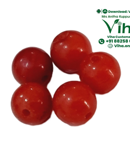 Coral Beads Natural, five red glossy beads with visible drilled holes