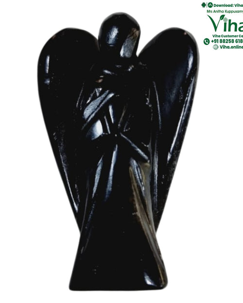 Black Tourmaline Angel, a carved winged figure with hands folded across the chest