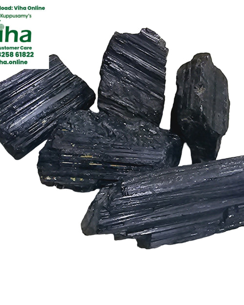 Black Tourmaline Stone with parallel striations and fractured ends
