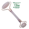 Rose Quartz Face Roller, a pink-tinted dual-ended facial roller featuring two round stones and copper-toned metal hardware