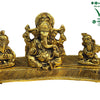 Ganesha group on a leaf-shaped base, a larger elephant-headed figure seated between two smaller seated figures
