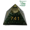 Green Aventurine Pyramid with Money Symbols, a dark green pyramid-shaped object with gold-toned numbers and geometric symbols embedded inside