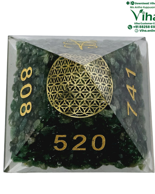 Green Aventurine Pyramid with Money Symbols, rough stones suspended inside