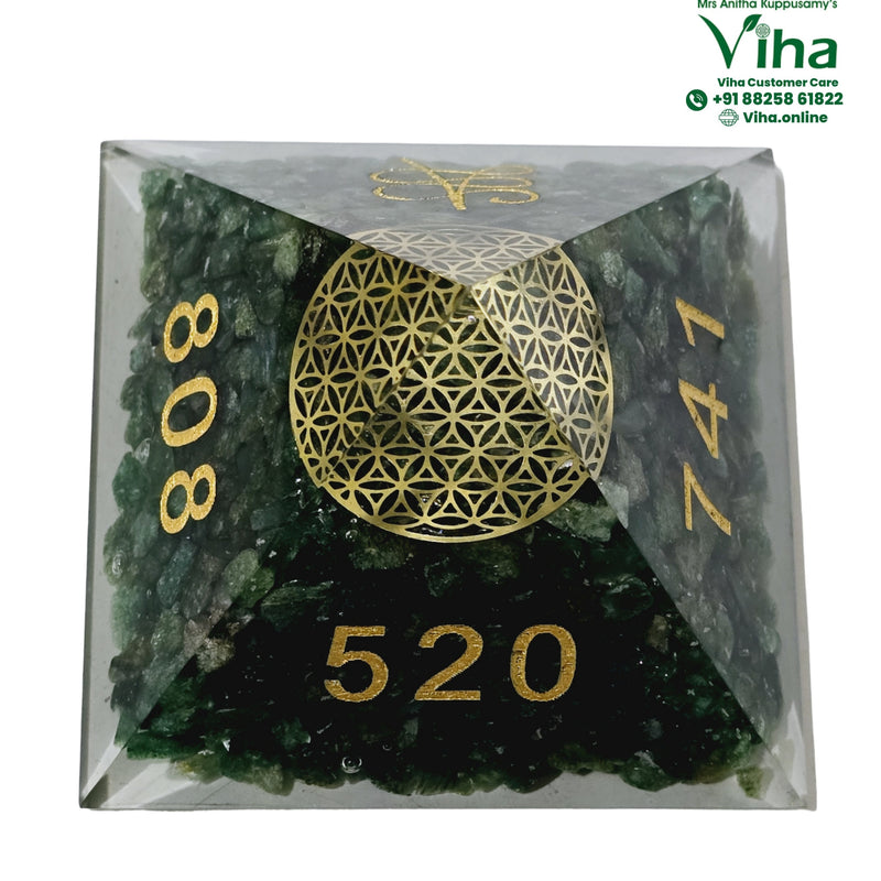 Green Aventurine Pyramid with Money Symbols, rough stones suspended inside