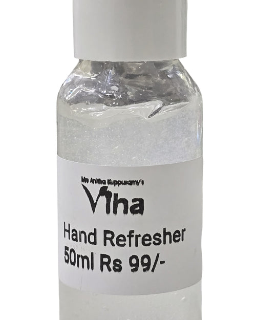 Viha's Hand Refresher, a small clear plastic bottle of clear gel with a white flip-top cap and a white label
