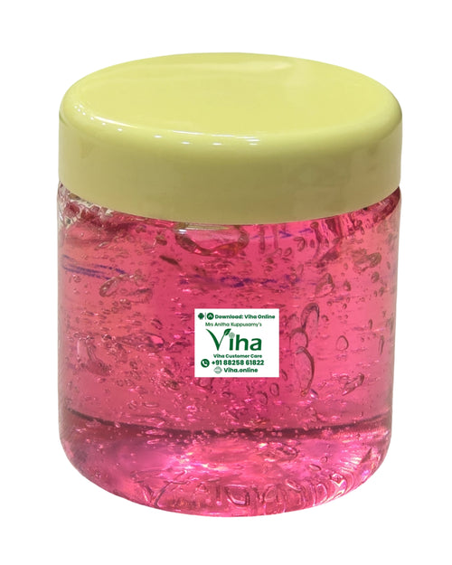 Strawberry Gel, a short round jar with a glossy pale-yellow cap containing pink translucent gel filled with air bubbles against a white background