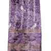 Cotton Silk Saree with Border, a folded purple fabric featuring white bird graphics and striped patterns