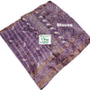 Cotton Silk Saree with Border, a folded purple fabric featuring white bird patterns and gold-toned borders