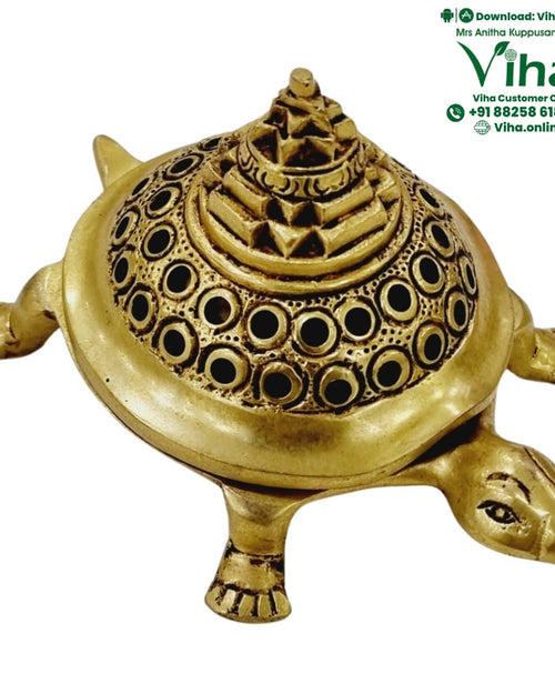 Tortoise Mahameru With Yantra Doop Stand, a gold-toned tortoise figure with a tiered patterned shell and round cut-outs