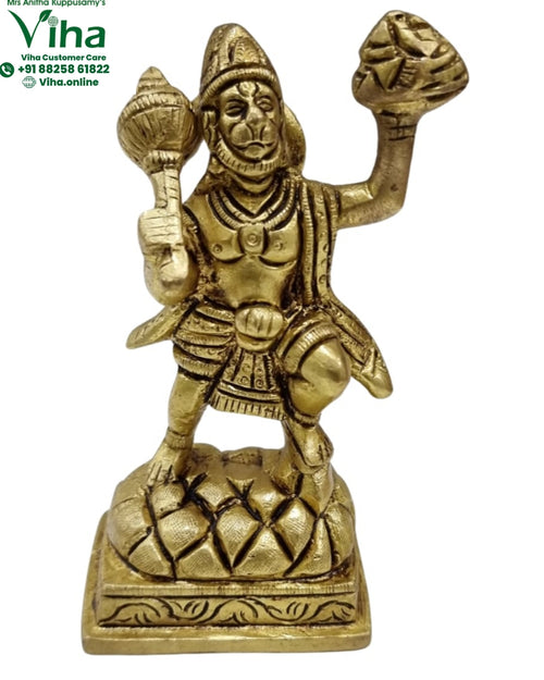 Veer Hanuman in brass, striding figure on a lotus base with a mace in one hand and a rounded mass raised in the other