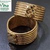 Impon Toe Ring with horizontal ribbed texture and faceted central ornament
