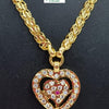 Impon Chain with Pendant, a gold-toned chain holding a heart-shaped pendant paved with twenty-five clear stones and one red stone