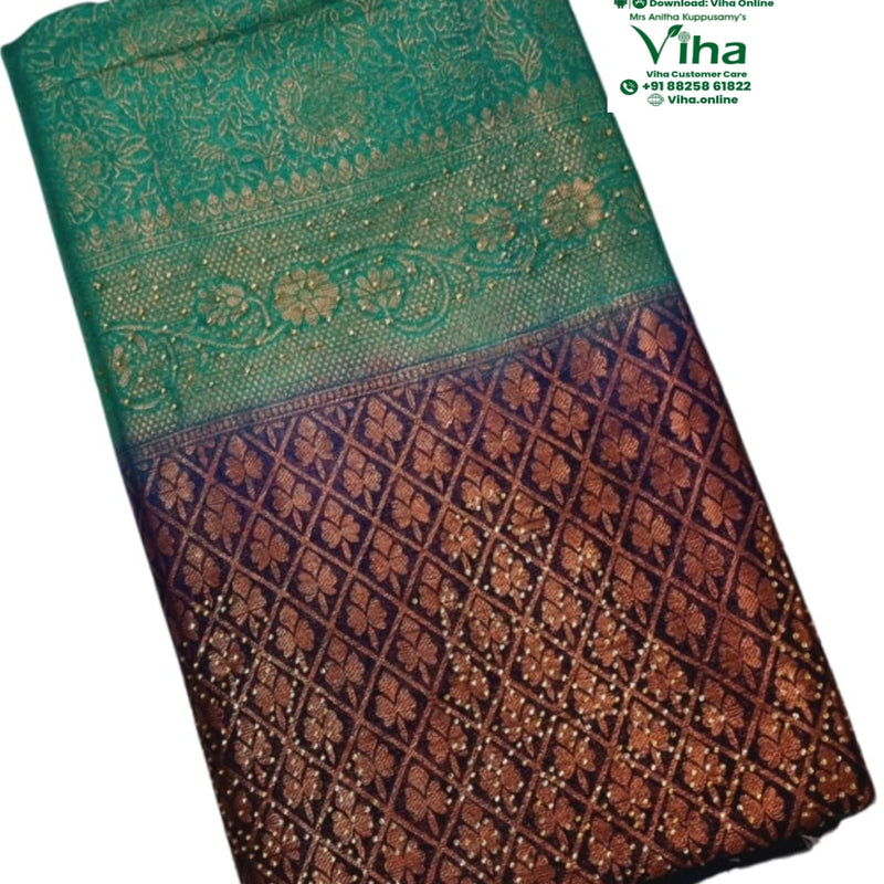Soft Silk Saree with Stone Work, a folded fabric with green upper section and dark brown lower section featuring gold-toned floral patterns and diamond lattice