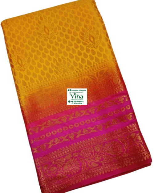Soft Silk Saree With Blouse, folded yellow and pink fabric featuring gold-toned woven patterns with leafy motifs and geometric borders