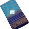 Soft Silk Saree With Blouse, a blue folded fabric with gold-toned patterns featuring leaf motifs and floral borders
