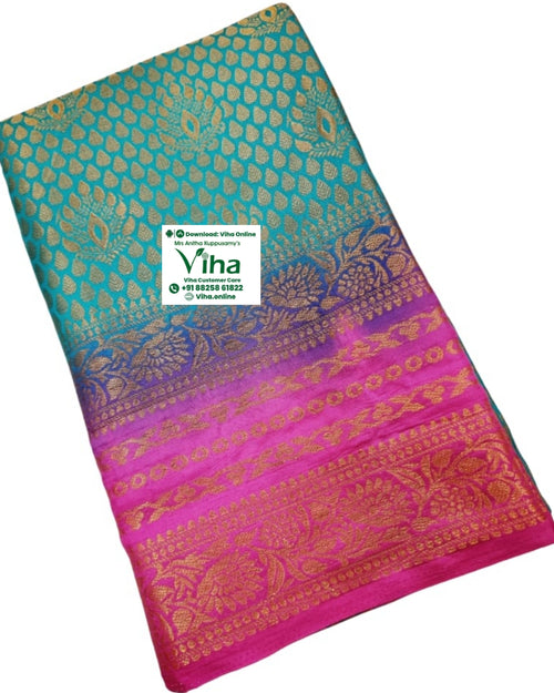 Soft Silk Saree With Blouse, folded blue and pink fabric with gold-toned woven leaf and floral patterns, featuring a gradient color transition
