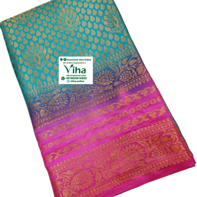 Soft Silk Saree With Blouse, folded blue and pink fabric with gold-toned woven leaf and floral patterns, featuring a gradient color transition