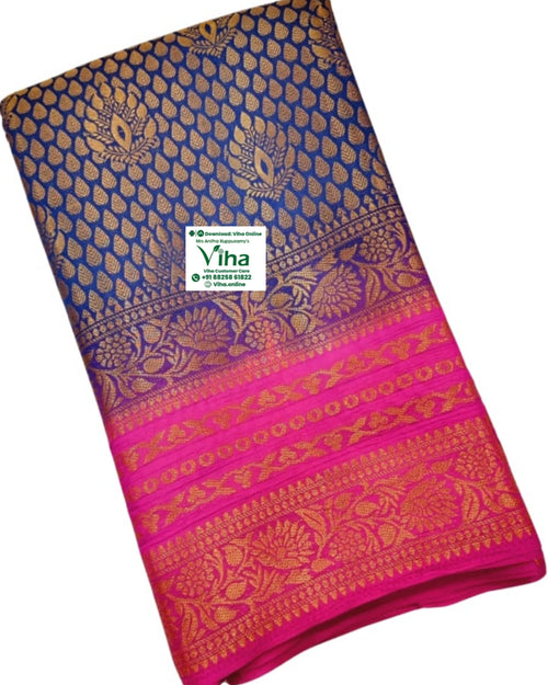 Soft Silk Saree With Blouse, a folded blue-and-pink textile patterned with metallic gold-toned leaf motifs, floral bands, and geometric borders