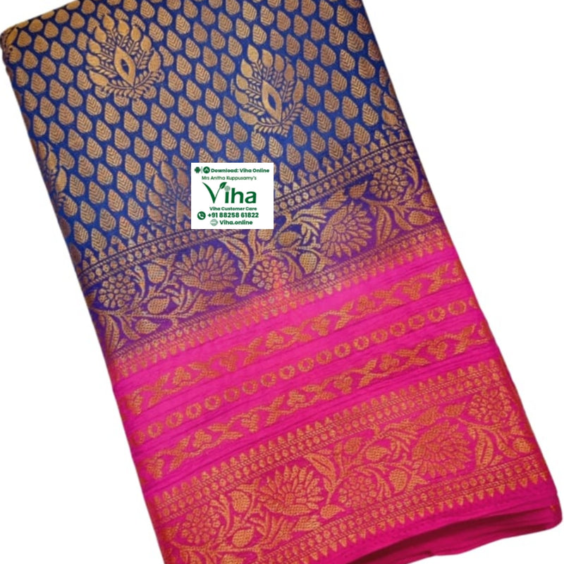 Soft Silk Saree With Blouse, a folded blue-and-pink textile patterned with metallic gold-toned leaf motifs, floral bands, and geometric borders
