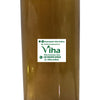 Nannari Syrup in a translucent plastic bottle with amber liquid inside