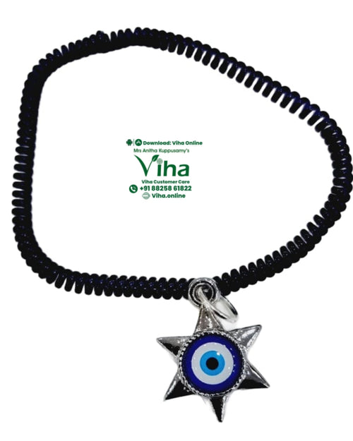 Star Evil Eye Anklet, a glossy black coiled band with a silver-toned six-pointed star pendant featuring concentric blue and white circles around a black center