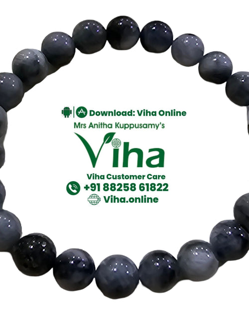 Catseye Bracelet, elastic strand of dark grey beads with a glossy cat's eye sheen