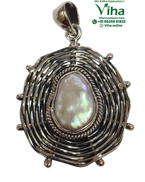 Original Pearl Designer Pendant In Pure Sterling Silver, irregular oval in a woven frame